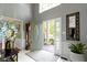 Inviting foyer featuring a grand front door, tile floors and a view to the front lawn at 14215 Stacey St, Carmel, IN 46033