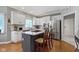 A view of a bright kitchen featuring granite counters and stainless steel appliances at 14215 Stacey St, Carmel, IN 46033
