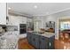 An open kitchen with granite countertops, stainless appliances, and a stylish island at 14215 Stacey St, Carmel, IN 46033