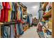Walk-in closet with ample hanging space, shelves, and organization for clothes and accessories at 14809 Senator Way, Carmel, IN 46032