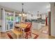 Bright kitchen featuring a dining area, pendant lighting, and an open layout perfect for Gathering meals at 14809 Senator Way, Carmel, IN 46032