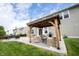 Backyard patio features a cozy gazebo with outdoor seating, perfect for relaxing and entertaining guests at 16579 Lakeville Xing, Westfield, IN 46074