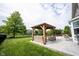 Outdoor living at its finest with a gazebo and expansive patio area, perfect for relaxing and entertaining at 16579 Lakeville Xing, Westfield, IN 46074