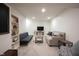 Cozy basement area featuring neutral carpet and comfortable seating at 16579 Lakeville Xing, Westfield, IN 46074
