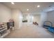 Spacious basement with neutral walls and carpeting offers room for activities at 16579 Lakeville Xing, Westfield, IN 46074