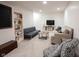 Inviting basement with two couches and a bookshelf at 16579 Lakeville Xing, Westfield, IN 46074