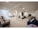 Spacious finished basement with neutral carpet, recessed lighting, and ample room for recreation and relaxation at 16579 Lakeville Xing, Westfield, IN 46074