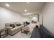 Bright basement with comfortable couches and recessed lighting at 16579 Lakeville Xing, Westfield, IN 46074