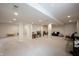 Large finished basement offering versatile space for various activities, play areas, and storage solutions at 16579 Lakeville Xing, Westfield, IN 46074