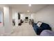 Finished basement area featuring a comfortable seating area and entertainment setup, perfect for Gathering gatherings at 16579 Lakeville Xing, Westfield, IN 46074