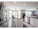 Bright breakfast nook with natural light, pendant lighting, and view into open kitchen space at 16579 Lakeville Xing, Westfield, IN 46074