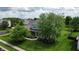 Charming two-story home featuring a well-manicured lawn and beautiful mature trees in a Gathering-friendly neighborhood at 16579 Lakeville Xing, Westfield, IN 46074