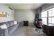 Comfortable home office featuring a work area, seating, and natural light from a large window at 16579 Lakeville Xing, Westfield, IN 46074