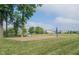 Community volleyball court with net and sandy surface, ideal for outdoor recreation and social gatherings at 16579 Lakeville Xing, Westfield, IN 46074
