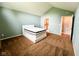 A bedroom features neutral walls and carpet with a comfortable bed, and an ensuite bath at 16657 Brownstone Ct, Westfield, IN 46074