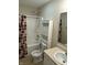 Functional bathroom featuring a shower-tub combo, vanity with sink, and coordinated fixtures at 1716 W Witt Ave, Lebanon, IN 46052