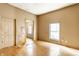 Bright living room with natural light and wood floors, providing an inviting and open space at 2114 Sugar Grove Ave, Indianapolis, IN 46202