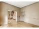 Spacious living room featuring wood floors, natural light, and easy access to other rooms at 2114 Sugar Grove Ave, Indianapolis, IN 46202