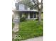 Two story home with covered porch and lawn at , Indianapolis, IN 46205
