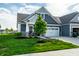 Stylish home featuring a two-car garage, manicured lawn, and inviting curb appeal at 2675 Cottage Ct, Brownsburg, IN 46112