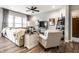 Cozy living room featuring a comfortable sectional sofa, accent chair, and tasteful decor for relaxation at 2675 Cottage Ct, Brownsburg, IN 46112