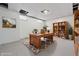 Finished basement creates functional home office space, complete with bookshelves and decor at 309 Poplar Rd, Indianapolis, IN 46219