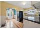 Cozy kitchen featuring ample counter space, appliances and sunlit dining nook at 309 Poplar Rd, Indianapolis, IN 46219