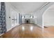 Bright living room boasts hardwood floors, fireplace, and built in shelves at 309 Poplar Rd, Indianapolis, IN 46219