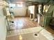 Unfinished basement with ceramic tile floors and a utility sink ready for customization or storage at 310 S Butler Ave, Indianapolis, IN 46219