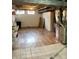 Basement storage area featuring exposed ductwork and essential home utilities at 310 S Butler Ave, Indianapolis, IN 46219