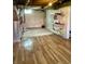 Utility basement area with painted walls, storage shelves and tiled floor at 310 S Butler Ave, Indianapolis, IN 46219