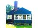 Charming blue home featuring a brick chimney, white-framed windows, and neatly landscaped front yard at 310 S Butler Ave, Indianapolis, IN 46219