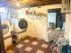 This functional laundry room includes a washer, dryer and ample space for storage and organization at 310 S Butler Ave, Indianapolis, IN 46219
