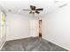 Bedroom featuring neutral walls, carpeted floor, ceiling fan and double door closet at 310 Wellington Overlook, Noblesville, IN 46060