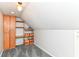 Spacious bonus room with built in cabinets and shelving for optimized storage at 310 Wellington Overlook, Noblesville, IN 46060