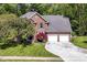 Beautiful brick two-story home with a well-maintained yard and a two-car garage at 310 Wellington Overlook, Noblesville, IN 46060