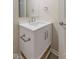 Bathroom vanity showcasing a white countertop, decorative pulls and fixtures at 3119 Earlswood Ln, Indianapolis, IN 46217