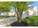 Charming single-Gathering home featuring a well-manicured lawn at 3119 Earlswood Ln, Indianapolis, IN 46217