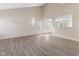 Spacious living room featuring neutral walls, modern floors, and abundant natural light at 3119 Earlswood Ln, Indianapolis, IN 46217