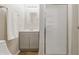 Bathroom featuring modern vanity, and a glass-enclosed shower stall at 316 S Roena St, Indianapolis, IN 46241