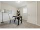 Inviting office space with stylish desk, chair, modern lighting, and carpeted floor at 316 S Roena St, Indianapolis, IN 46241