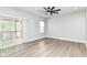 Bedroom featuring a ceiling fan and sliding glass door to a deck at 3241 Ruckle St, Indianapolis, IN 46205