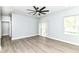 Bedroom featuring a ceiling fan and sliding glass door to a deck at 3241 Ruckle St, Indianapolis, IN 46205