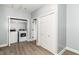 Functional laundry room with a washer, dryer, and closet storage at 3241 Ruckle St, Indianapolis, IN 46205