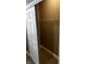 Walk-in closet with sliding doors, carpeted flooring, and wire shelving for organized storage at 336 W 29Th St, Indianapolis, IN 46208