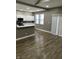 Modern kitchen featuring white cabinets, stainless steel appliances, and hardwood floors at 336 W 29Th St, Indianapolis, IN 46208