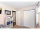 Bedroom featuring a TV, storage cubes, and a closet at 3608 Valley Lake Dr, Indianapolis, IN 46227
