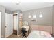 Bedroom featuring a vanity, and unique wall decor at 3608 Valley Lake Dr, Indianapolis, IN 46227