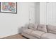 Bright living room with a comfortable sofa, artwork, and ample natural light at 3937 Candle Berry Dr, Indianapolis, IN 46235