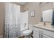 Bathroom with shower-tub combo, white vanity, and neutral walls at 4034 Cairo Way, Avon, IN 46123